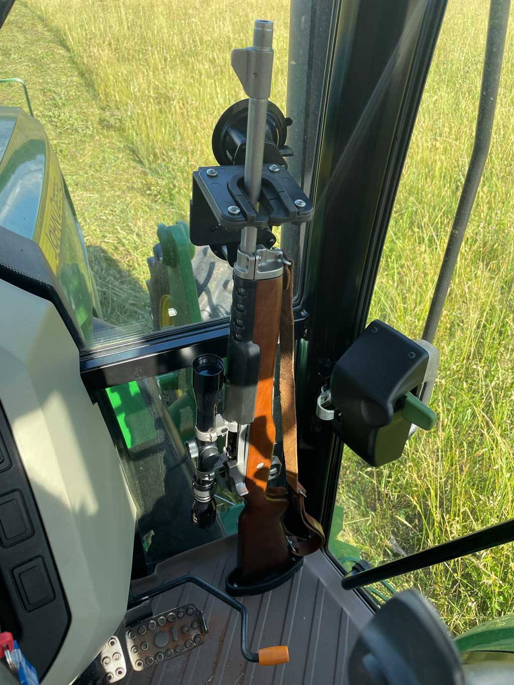 Enclosed Tractor Glass Mounted Gun Rack The Gun Grabber